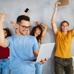 Group of young happy business people and designers. They working on new project. Startup concept.